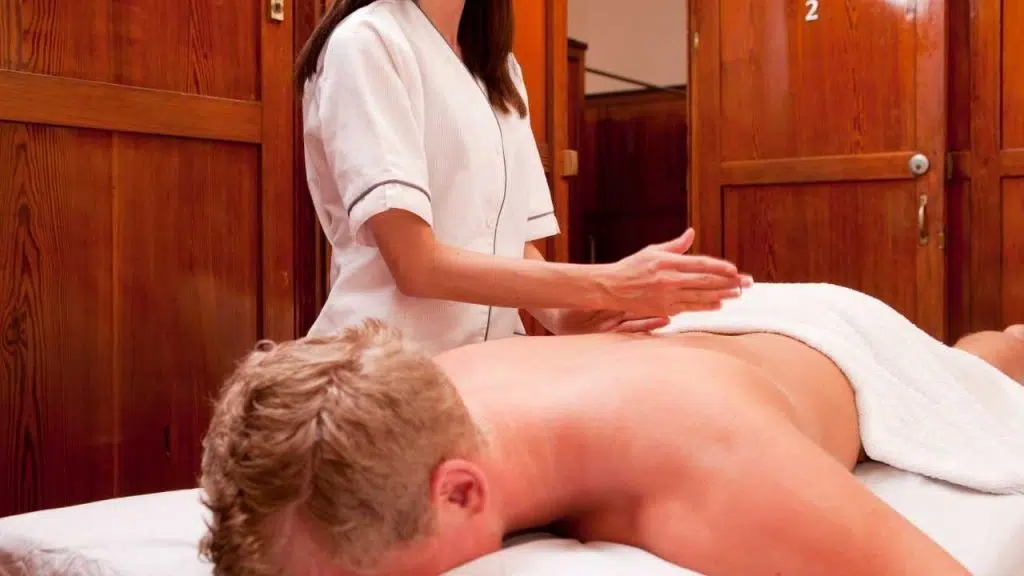 How is percussive therapy related to massage guns?