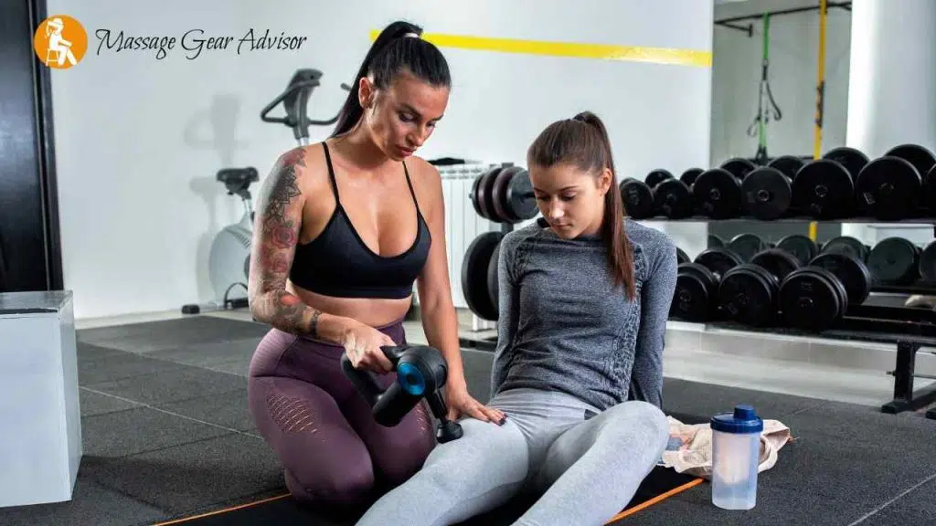 massage gun during Workout